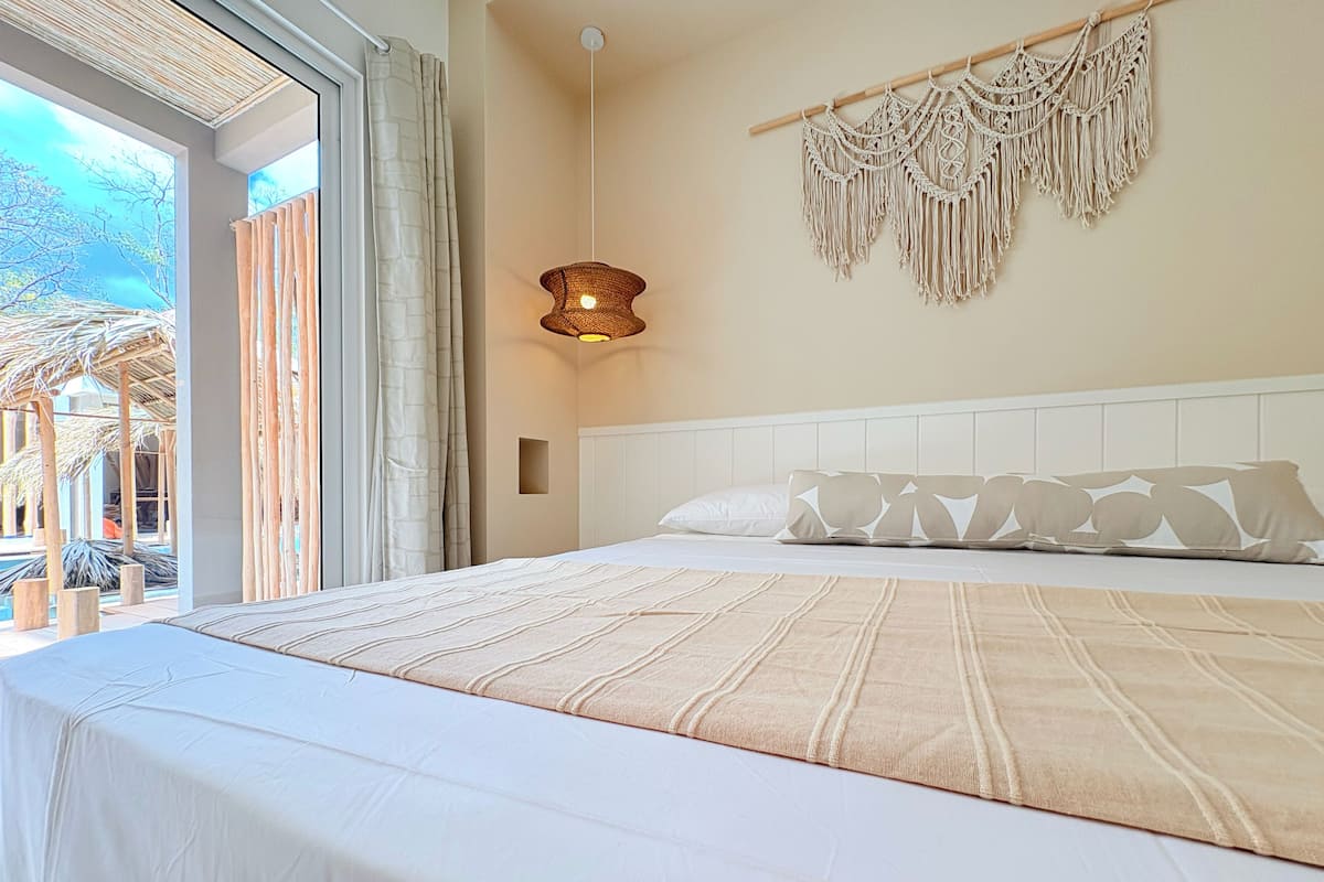 Deluxe Villa, Pool View | In-room safe, blackout drapes, soundproofing, iron/ironing board