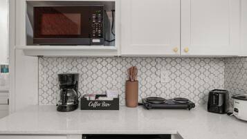 Microwave, stovetop, coffee/tea maker, toaster