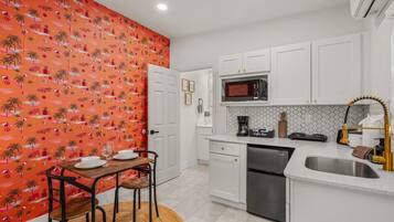 Microwave, stovetop, coffee/tea maker, toaster