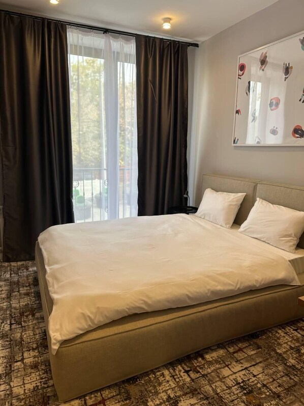 Deluxe Double Room, Courtyard View | Blackout drapes, soundproofing, iron/ironing board, free WiFi - Unit Hotel (Almaty)