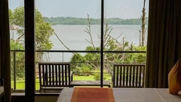 Deluxe Double Room, Balcony, Garden View | In-room safe, blackout drapes, soundproofing, iron/ironing board