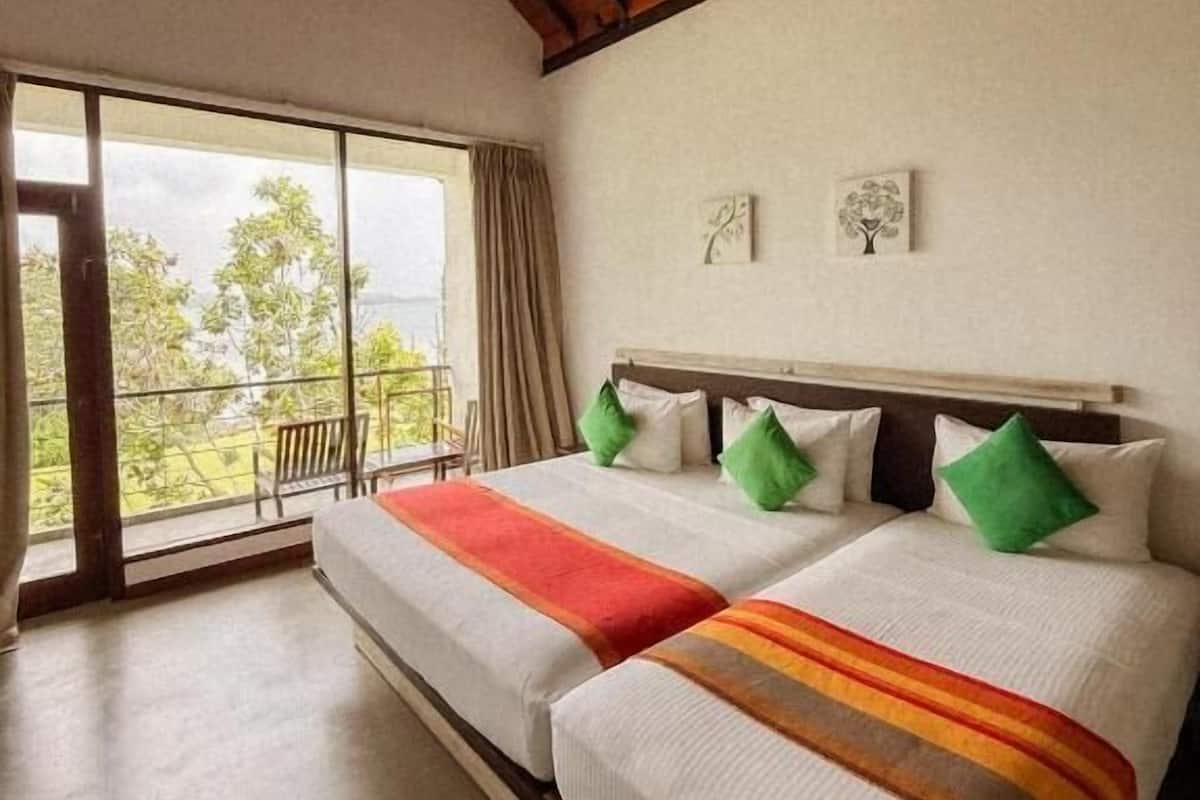 Deluxe Triple Room, Balcony, Lake View | In-room safe, blackout drapes, soundproofing, iron/ironing board