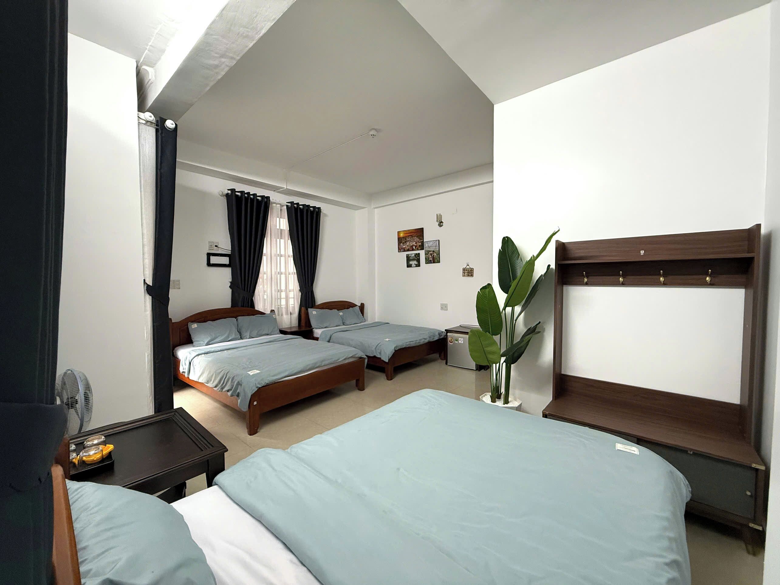 Family Triple Room, Balcony, City View | Blackout drapes, iron/ironing board, free WiFi