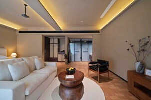 Luxury Twin Room, Mountain View | Living area | TV