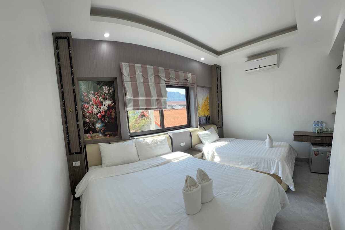 Family Triple Room, City View | In-room safe, blackout drapes, free WiFi