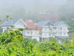 Exterior - Affordable garden‑view stay in misty Munnar (Chithirapuram)