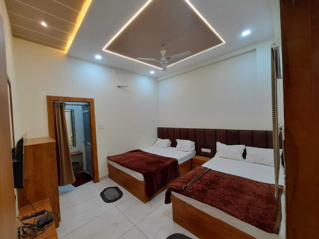 Premium bedding, desk, laptop workspace, soundproofing