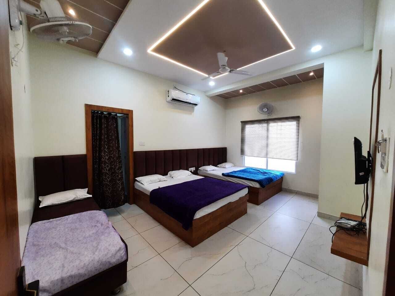 Family Room | Premium bedding, desk, laptop workspace, soundproofing