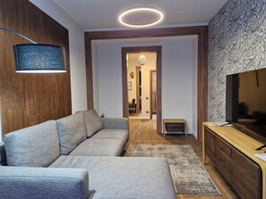 Luxury Apartment, Balcony, City View | Living area | 40-inch flat-screen TV with digital channels - Luxury apart with a view Victory Square (Minsk)