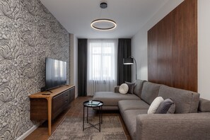 Lyxlägenhet - balkong - utsikt mot staden | Vardagsrum | 40-tums platt-tv med digitalkanaler