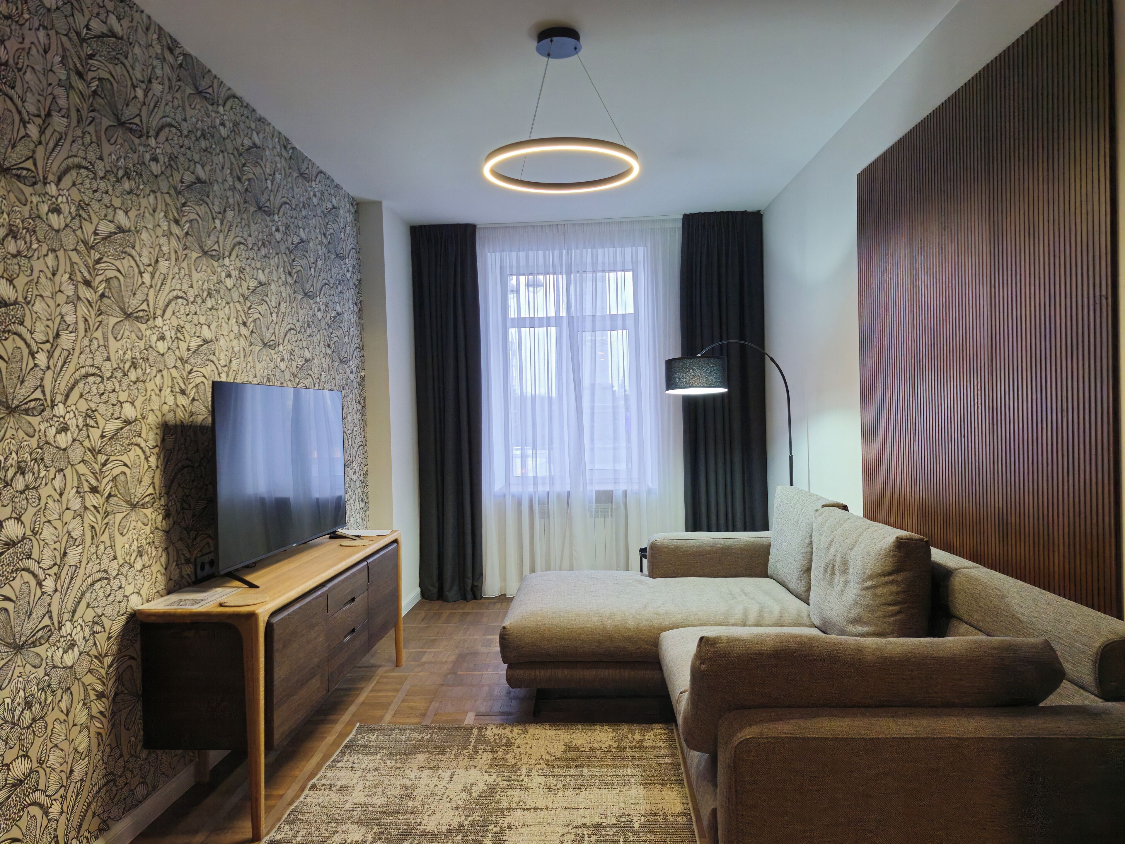 Luxury Apartment, Balcony, City View | Living area | 40-inch flat-screen TV with digital channels