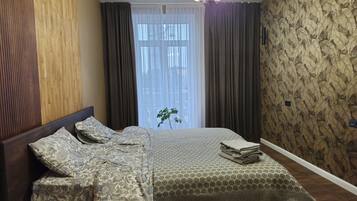 Luxury Apartment, Balcony, City View | Blackout curtains, soundproofing, iron/ironing board, free WiFi