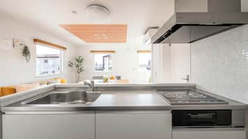 Fridge, microwave, stovetop, cookware/dishes/utensils