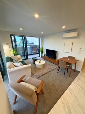 Living area - Brand-New 1BR Apartment near Te Kaha Stadium (Christchurch)