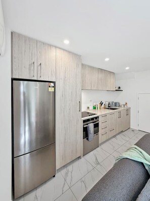Fridge, microwave, oven, stovetop - Stylish 2-Bedroom Home with Back Yard (Christchurch)