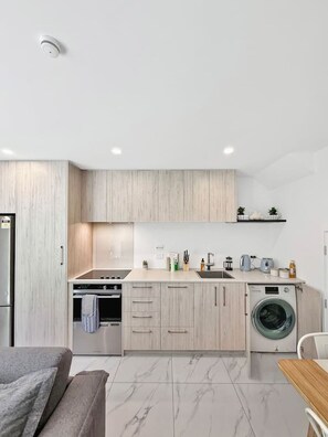 Fridge, microwave, oven, stovetop - Stylish 2-Bedroom Home with Back Yard (Christchurch)