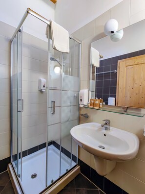 Shower, free toiletries, hair dryer, towels