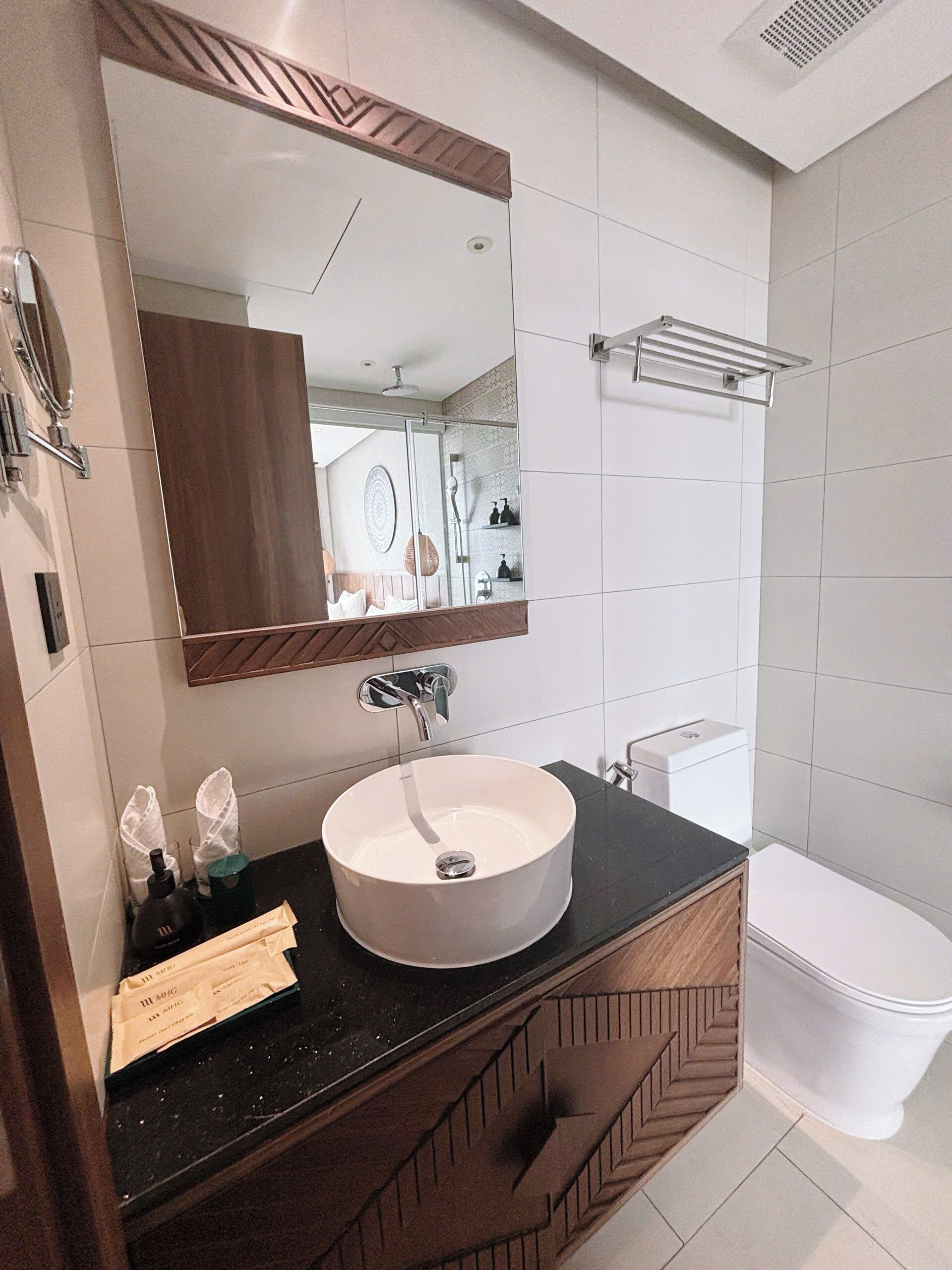 Shower, hair dryer, slippers, towels