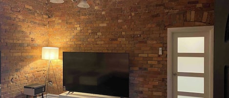 Apartment, 3Â Schlafzimmer, barrierefrei | Wohnzimmer | BĂŒcher