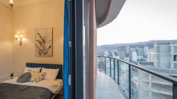 Apartment, City View | Blackout drapes, iron/ironing board, free WiFi