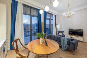 Apartment, City View | Living room | Flat-screen TV - HB apartments University Agro (Tbilisi)