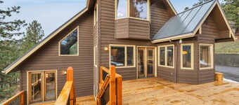 Escape to Montana at this spacious retreat. Nestled in a quiet, private setting, this rustic home features stunning views. Enjoy the peace of nature with the convenience of a quick drive to town — the perfect basecamp for your Montana getaway.