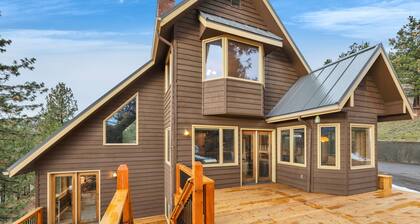 Escape to Montana at this spacious retreat. Nestled in a quiet, private setting, this rustic home features stunning views. Enjoy the peace of nature with the convenience of a quick drive to town — the perfect basecamp for your Montana getaway.