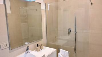 Comfort Apartment, Partial Sea View | Bathroom | Shower, hair dryer, towels, soap