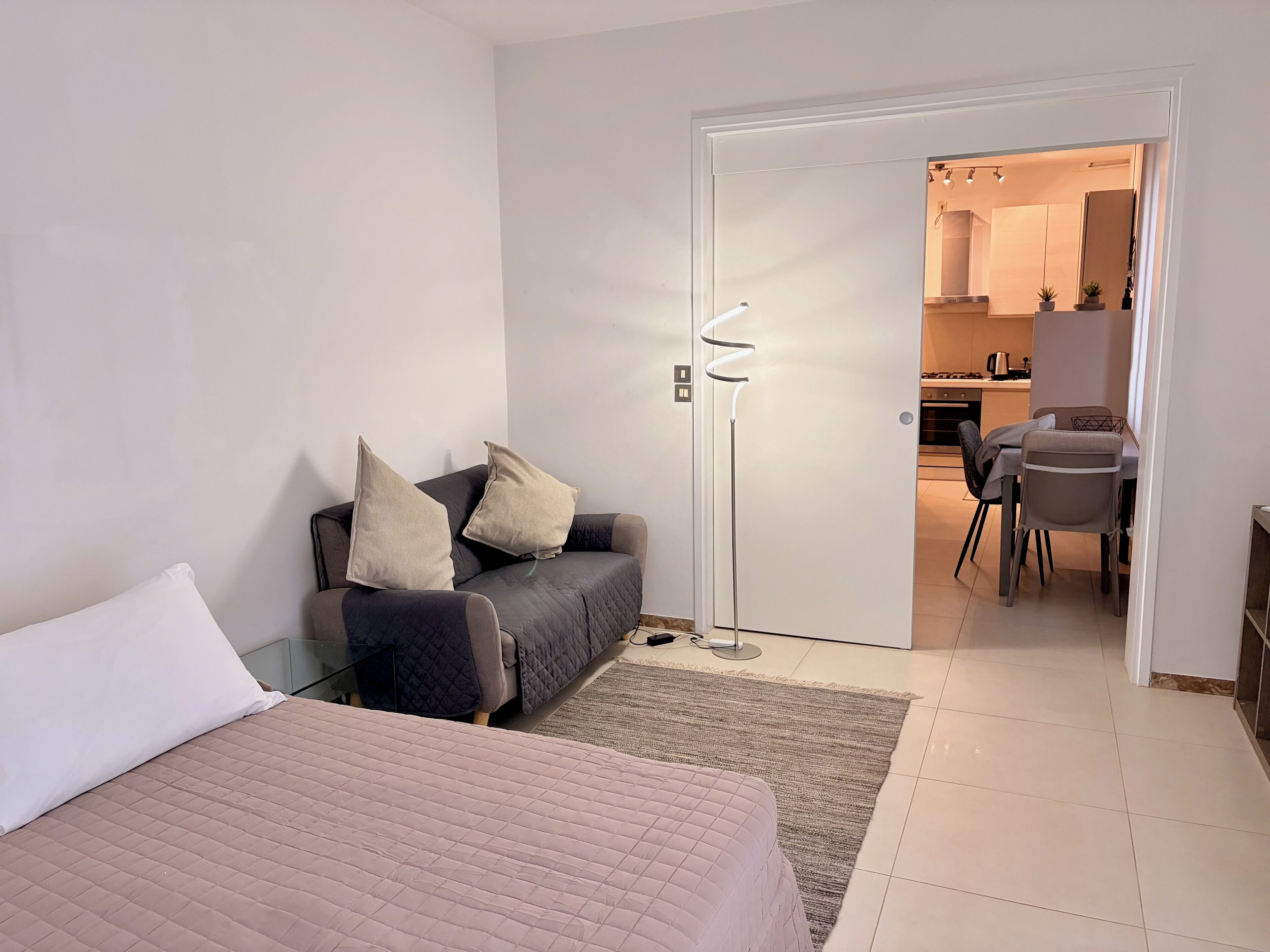 Comfort Apartment, Partial Sea View | Desk, laptop workspace, iron/ironing board, free WiFi