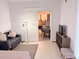 Comfort Apartment, Partial Sea View | Desk, laptop workspace, iron/ironing board, free WiFi
