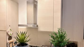 Appartement Confort, vue partielle sur la mer | Cuisine privée