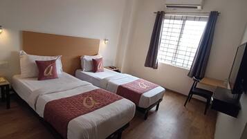 Premium bedding, laptop workspace, free WiFi, bed sheets