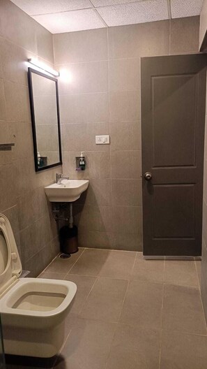 Shower, rainfall showerhead, free toiletries, hair dryer - ASTRA HOTEL AND SUITES SARJAPURA ROAD  (Bengaluru)