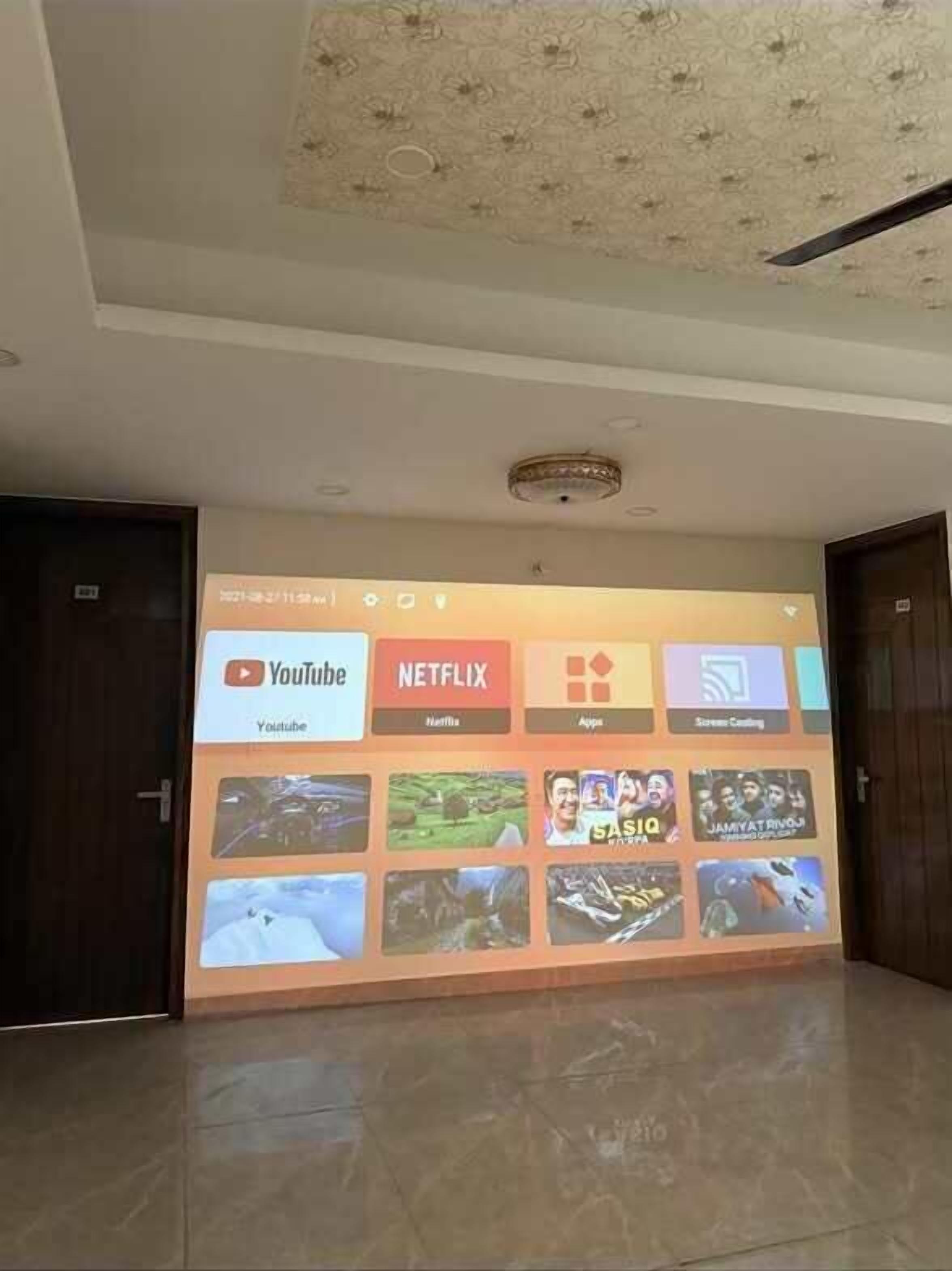 Deluxe Triple Room, Accessible Bathtub, Terrace | Living area | Computer monitors, printers