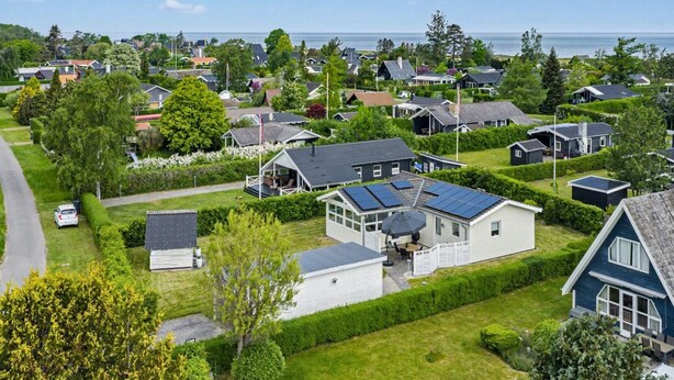 A residential area with houses, a road, and a body of water in the background. - "Solvejg" - 280m from the sea by Interhome (Otterup)