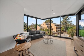 Apartment | Living room - Bright Unit With Secure Parking and Garden Access (Canberra)