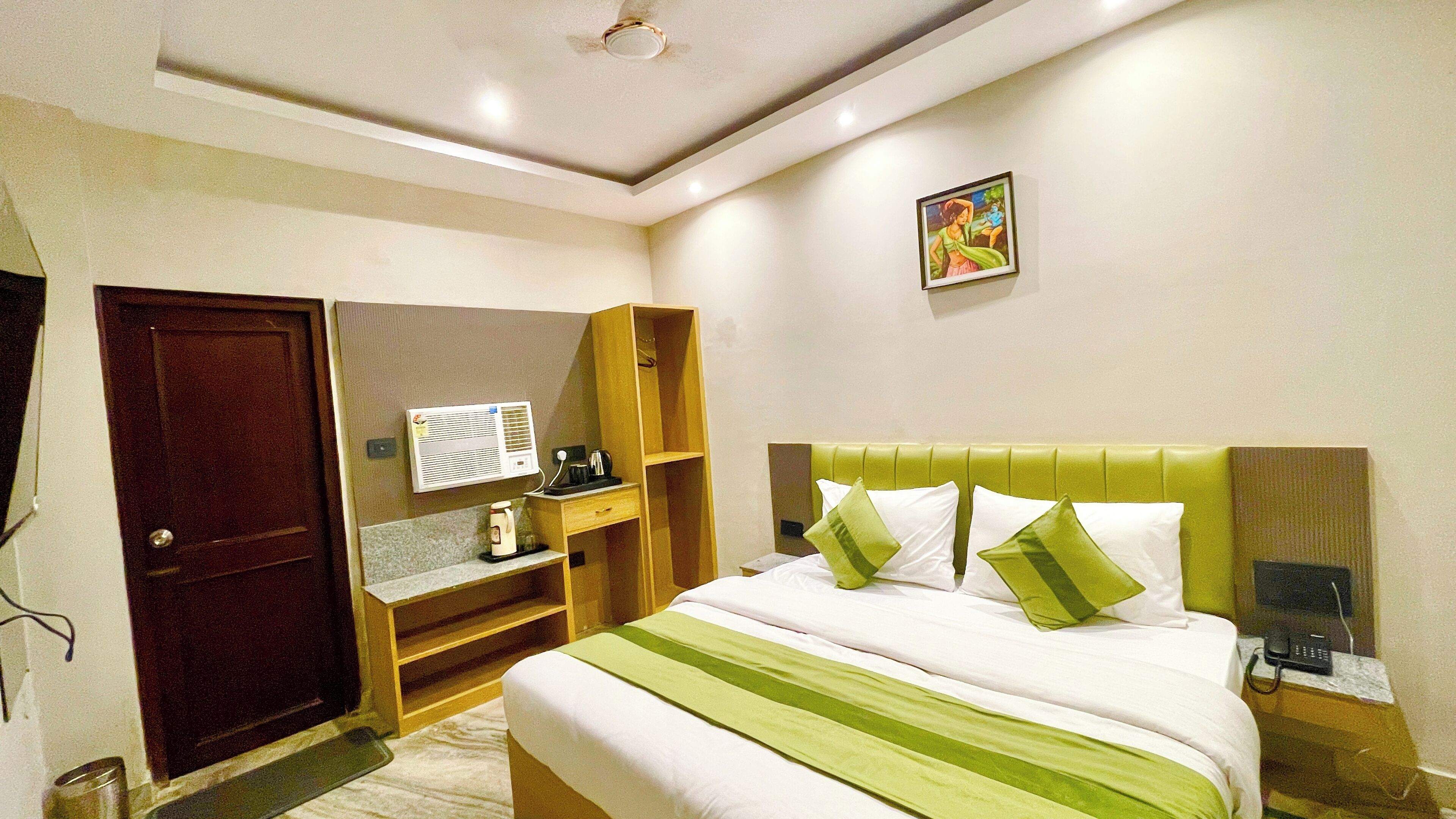 Premium bedding, desk, laptop workspace, soundproofing