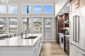 Fridge, microwave, oven, stovetop - Mountains are Calling | Our Penthouse Says Hello (Canmore)