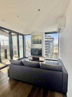 Living area - Cozy 2-bedroom apartment with AC in tranquil Docklands (Docklands)