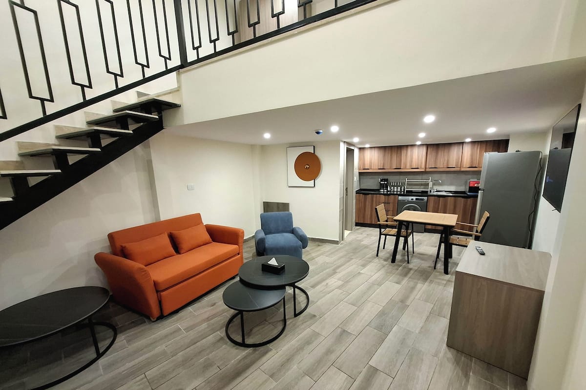 Appartement Duplex, vue ville | Coin séjour