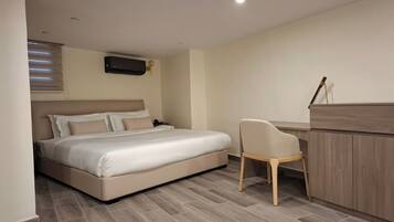 Duplex, City View | In-room safe, desk, laptop workspace, blackout drapes