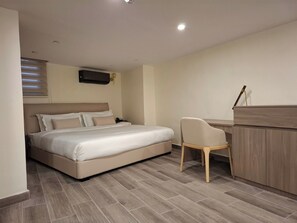 Duplex, City View | In-room safe, desk, laptop workspace, blackout curtains