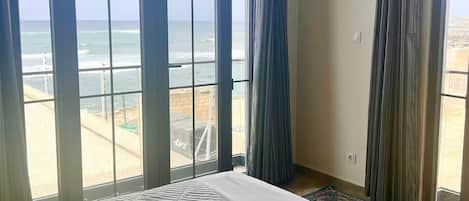 Comfort Apartment, 2 Bedrooms, Kitchen, Ocean View | Blackout drapes, iron/ironing board, free WiFi