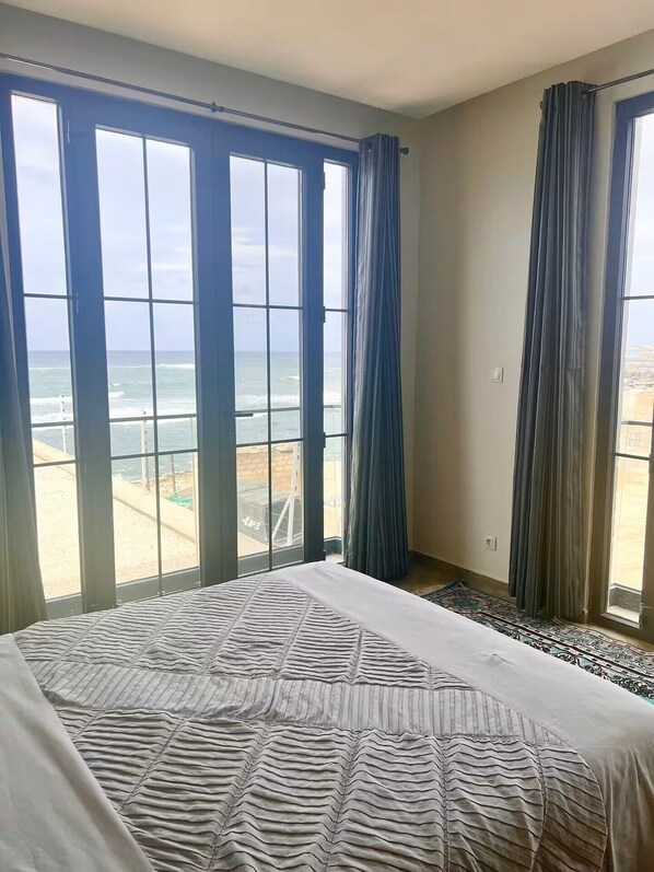 Comfort Apartment, 2 Bedrooms, Kitchen, Ocean View | Blackout drapes, iron/ironing board, free WiFi