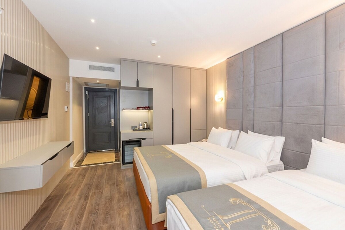 Family Room | Premium bedding, in-room safe, WiFi (free), bed sheets