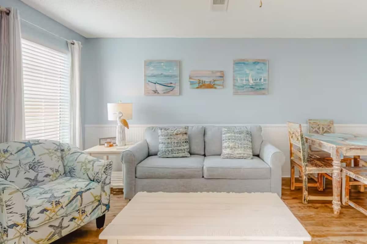 Signature Condo, 1 Bedroom, Balcony, Beach View | Living room