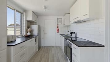 Apartment | Private kitchen | Fridge, microwave, oven, stovetop