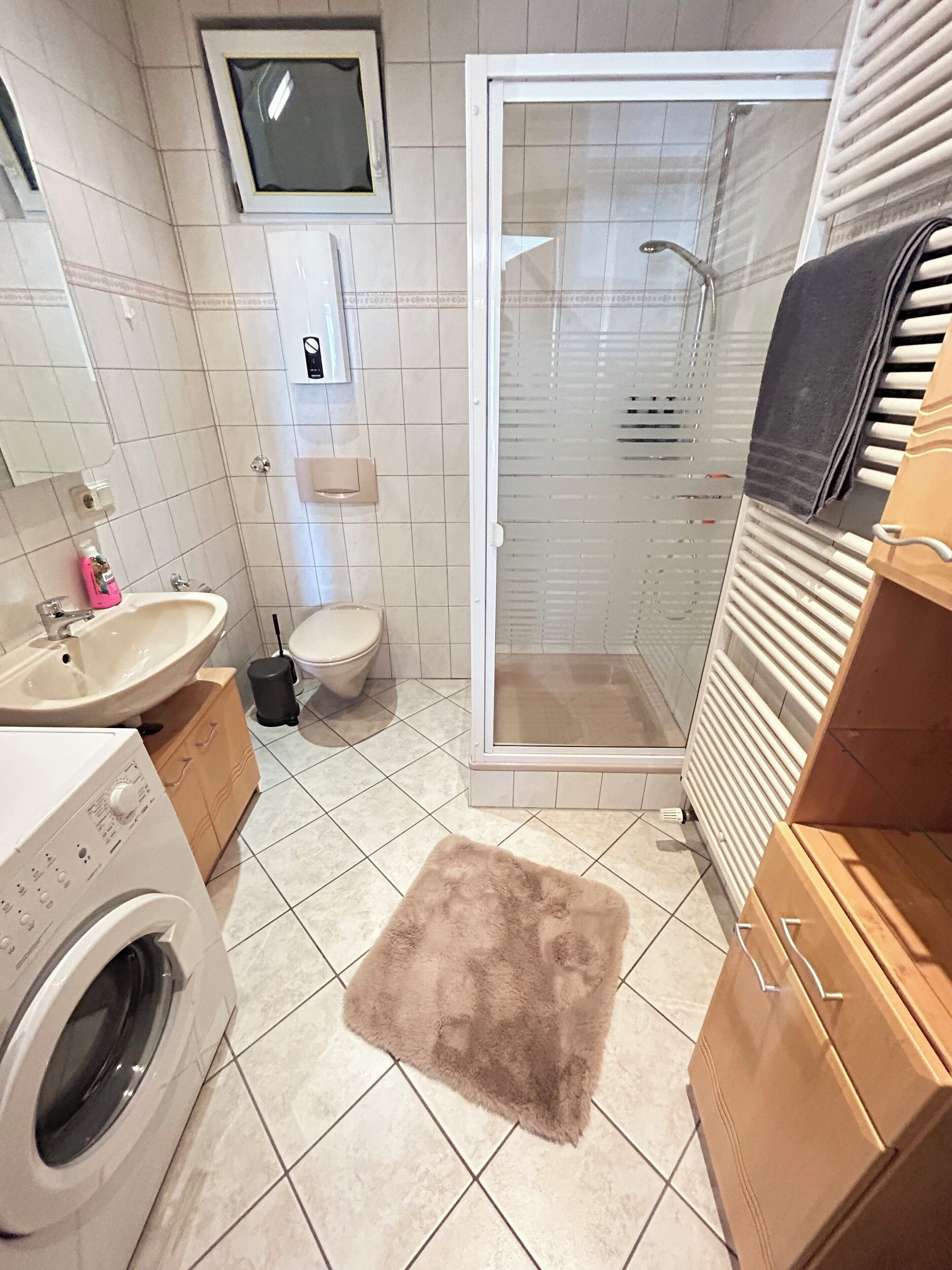 Hair dryer, towels, soap, shampoo