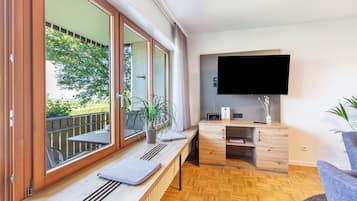 Bloc d'apartaments Deluxe, balcó, vistes al riu | Sala d'estar