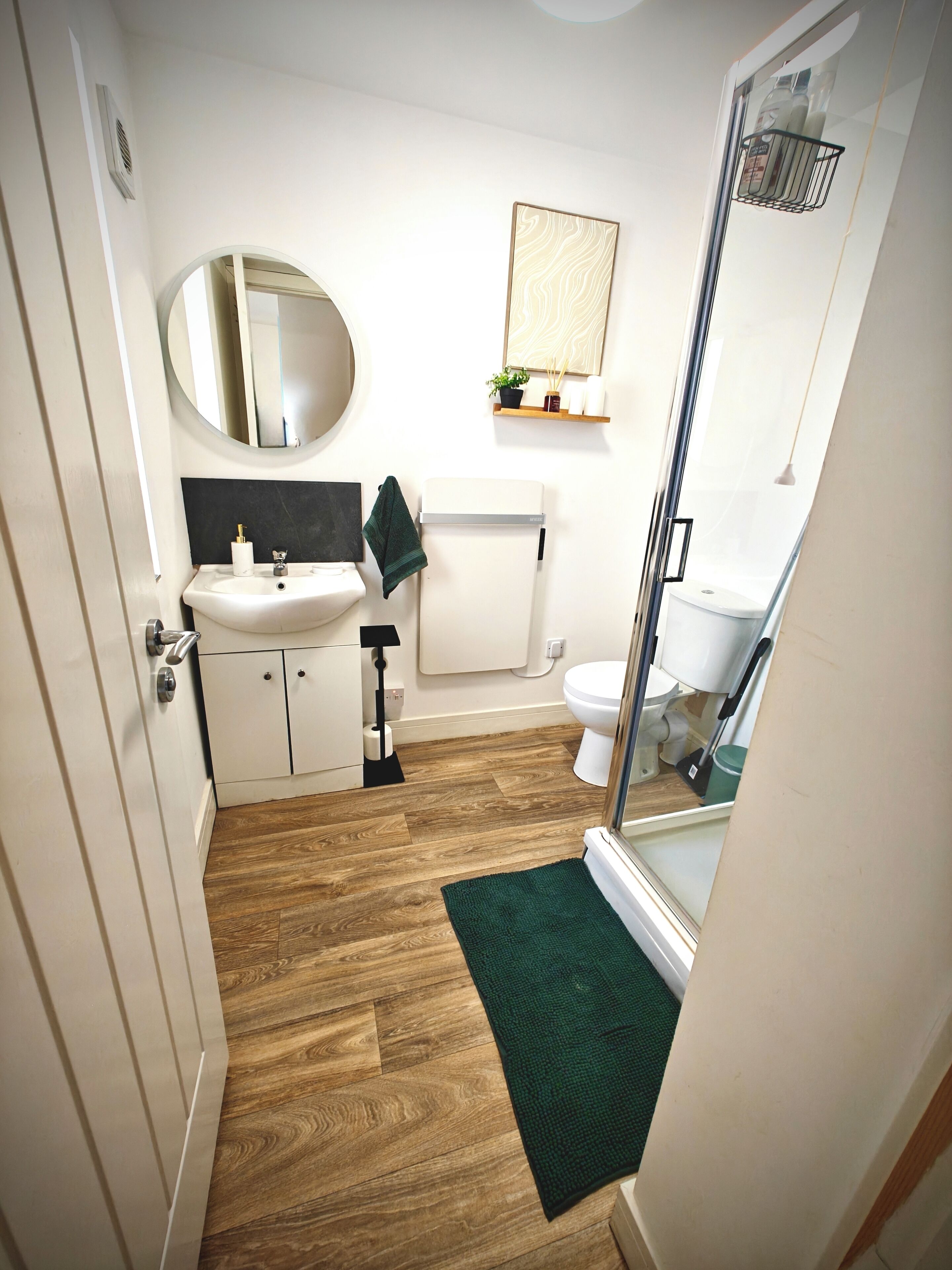 Shower, hair dryer, towels, soap